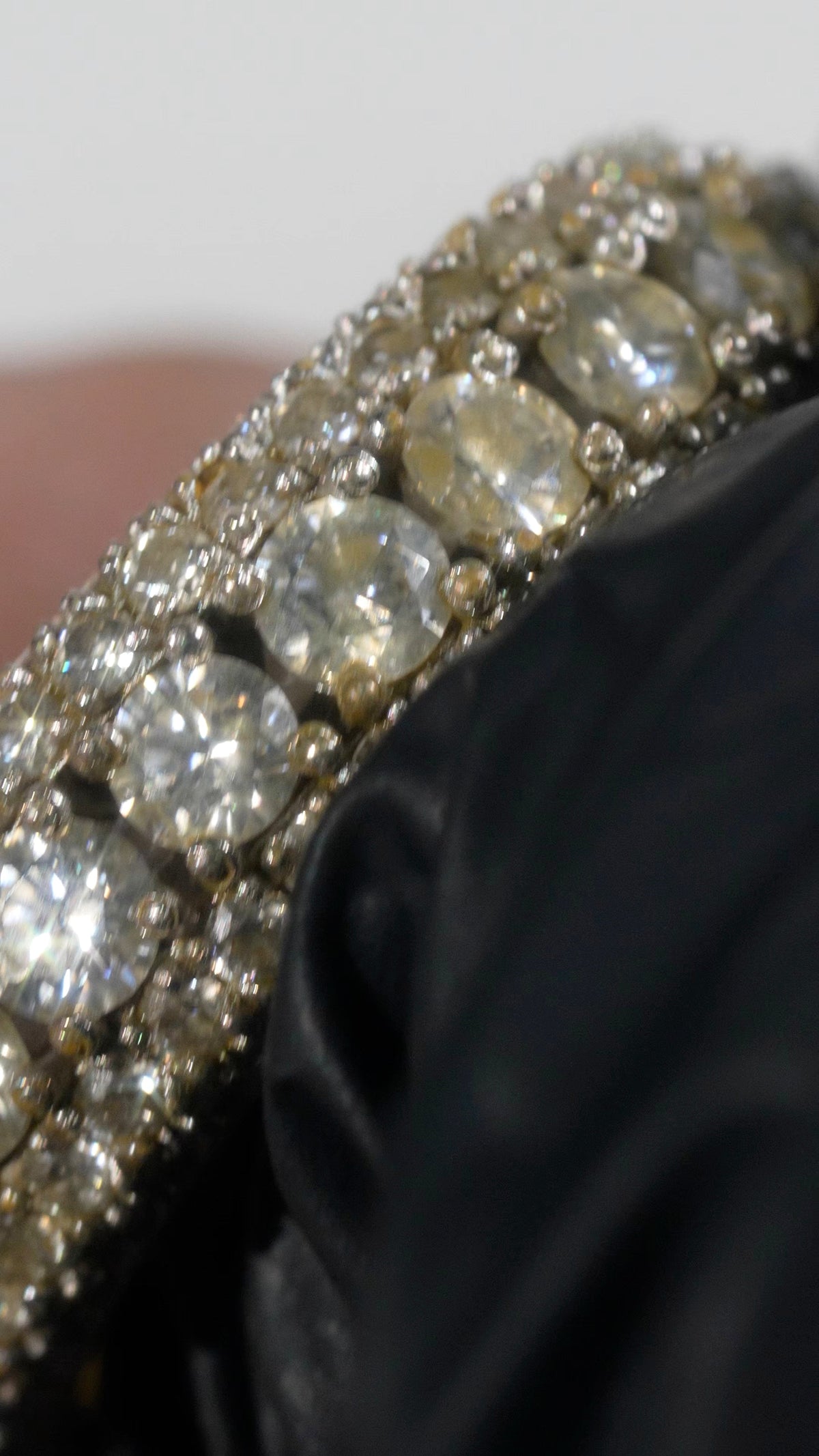 Close-up of residue around stones and settings on jewellery